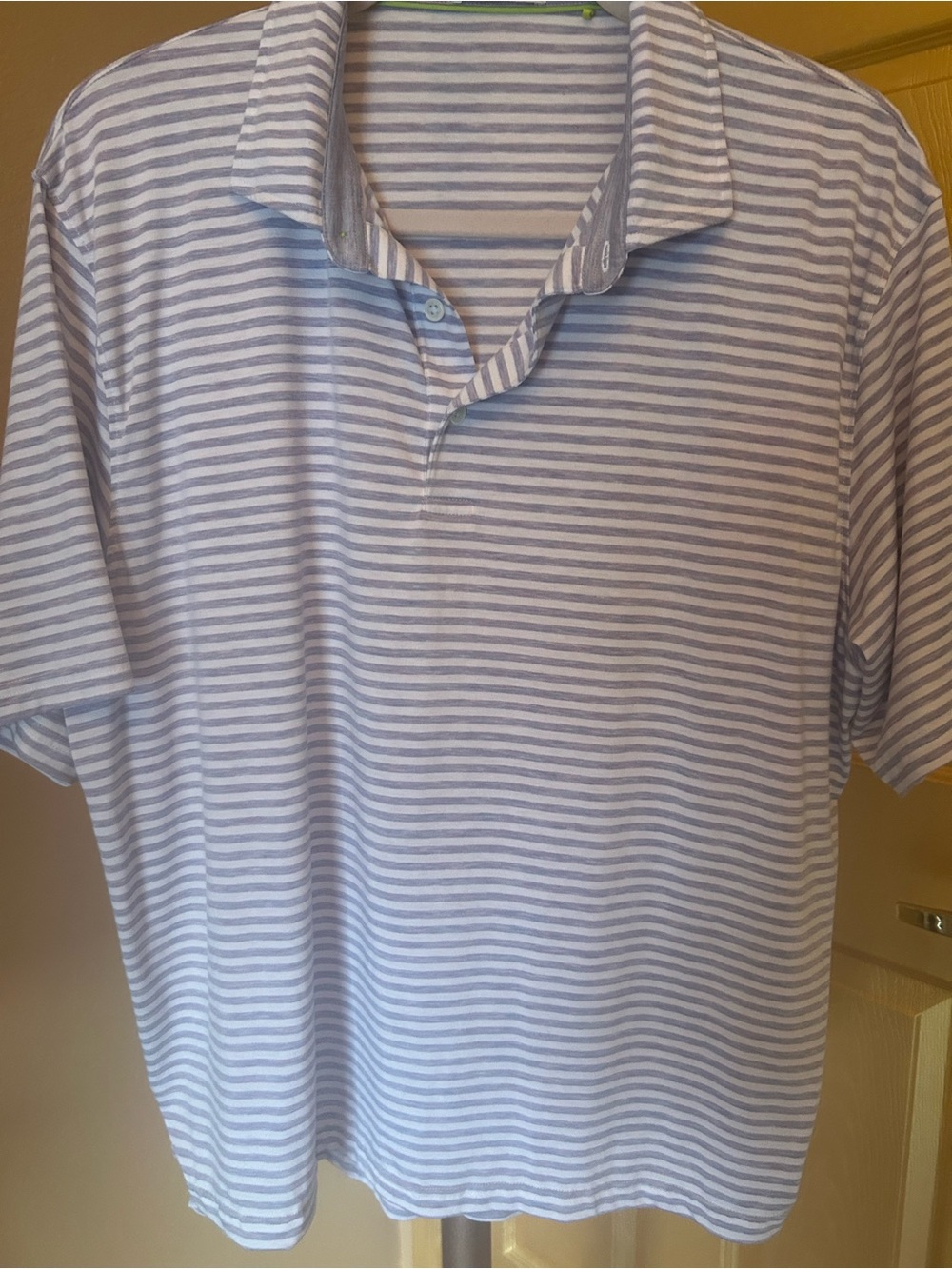 Tasc Cloud Performance golf shirt.
